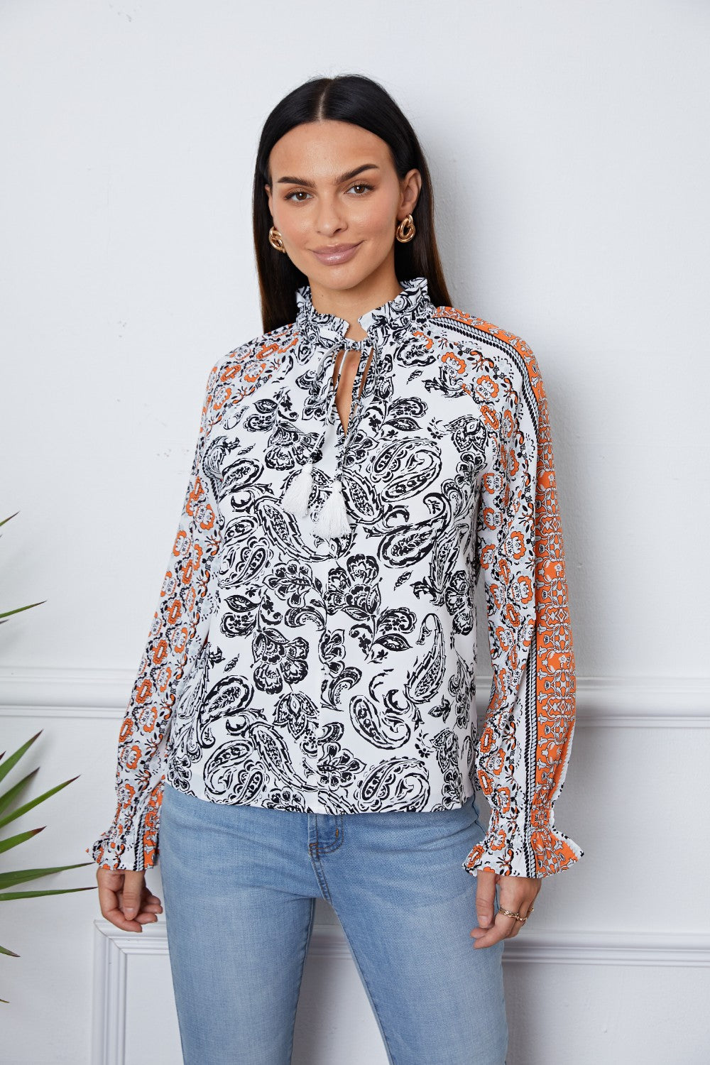 Tassel Tie Neck Printed Smocked Long Sleeve Blouse